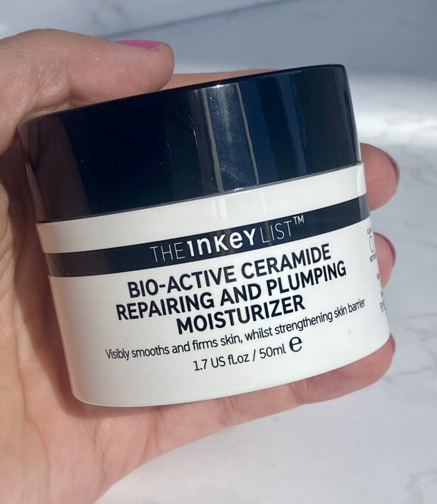 Hand holding The Inkey List Bio-Active Ceramide Moisturiser