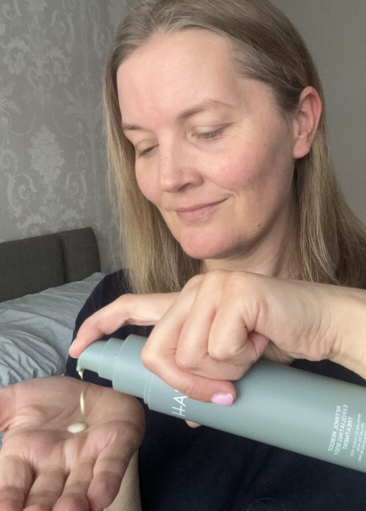 Applying the Retinol Reboot Exfoliating Body Treatment