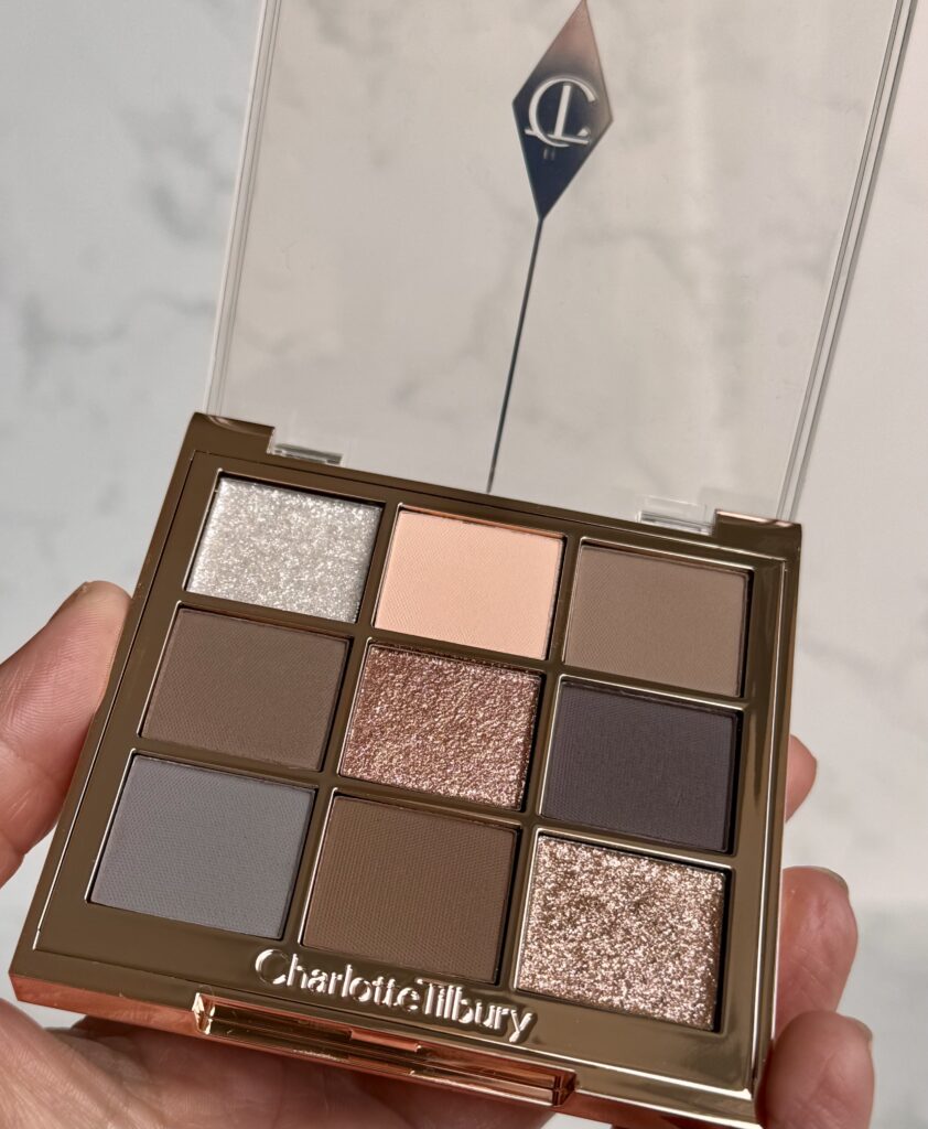 The Charlotte Tilbury Palette of Beautifying Eye Trends in Super Neutral nine shades shown close up