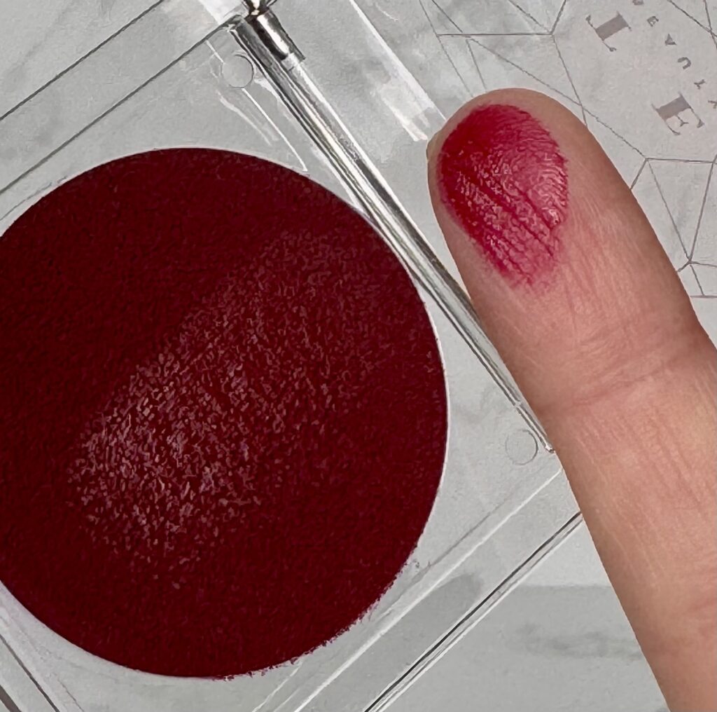 Finger swatch of Love Plum Plum