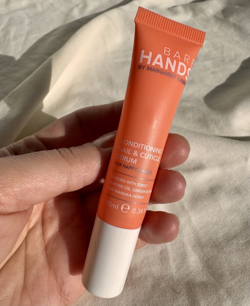 Holding Margaret Dabbs Conditioning Nail and Cuticle Serum