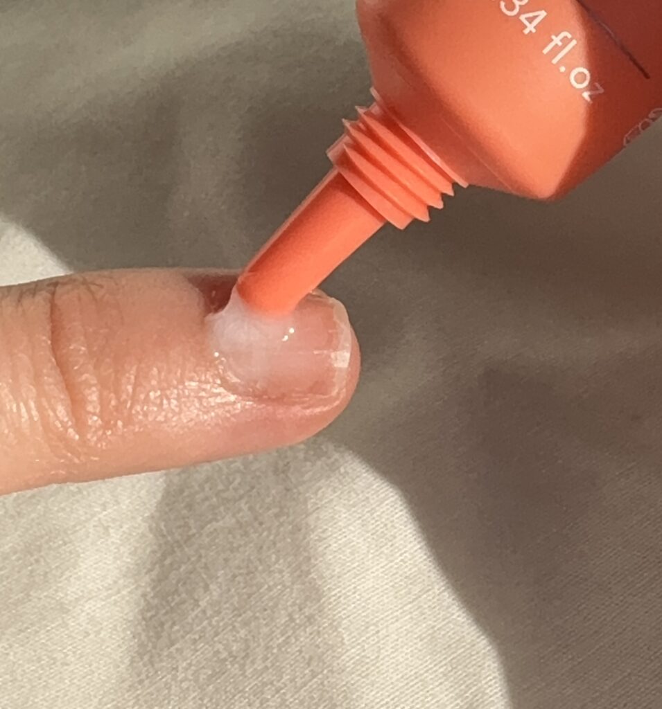 Showing application of nail and cuticle serum