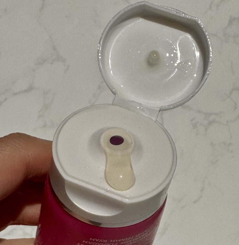 Squeeze lid dispenser