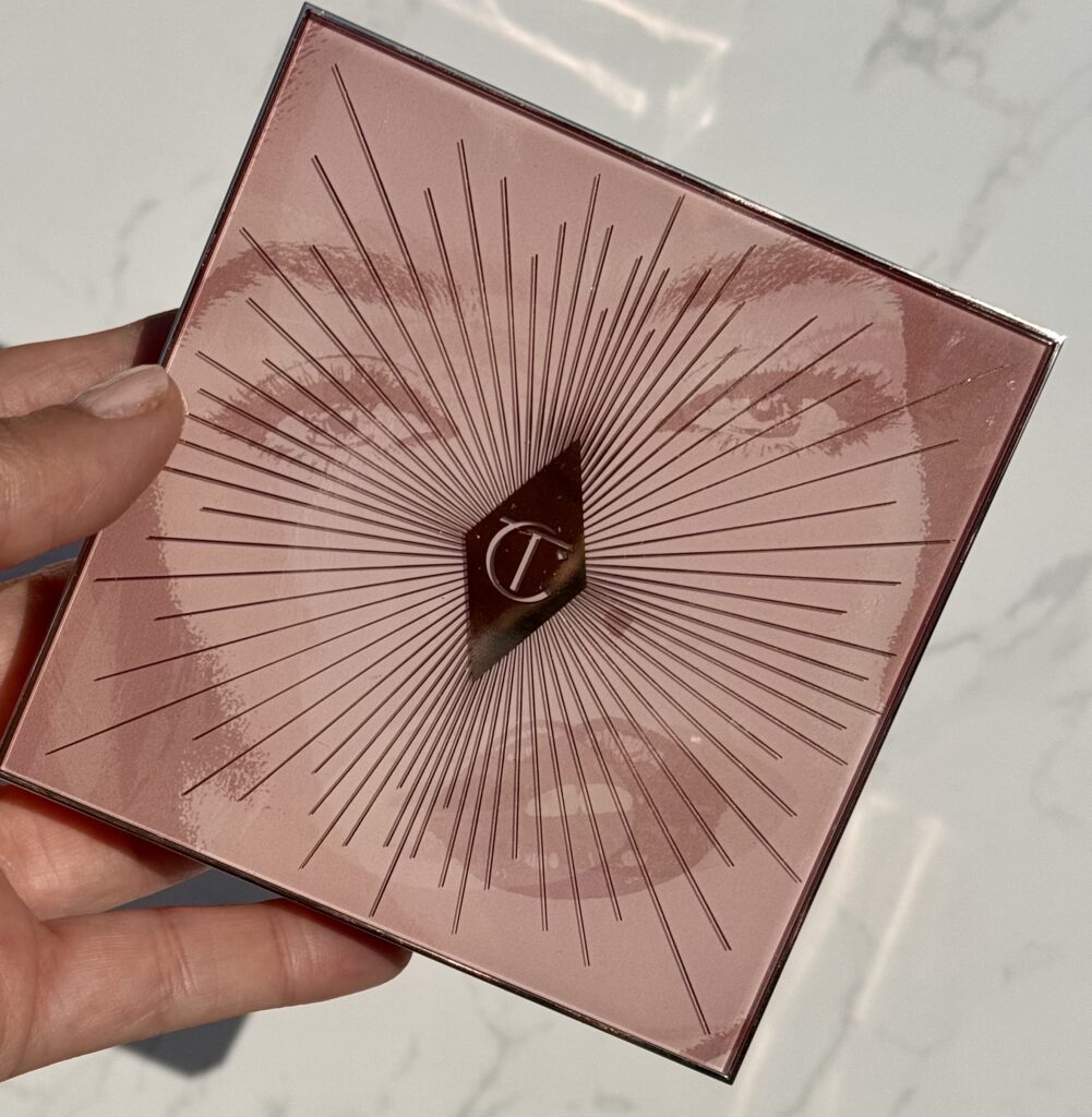 The out case design of the Charlotte Tilbury Nudegasm palette