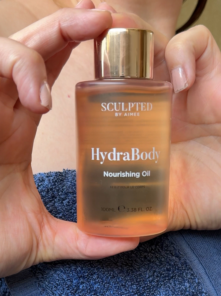 Holding the Sculpted by Aimee HydraBoost Nourishing Body Oil