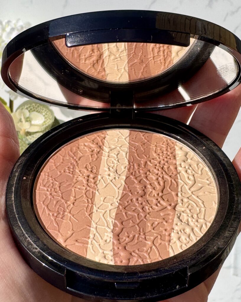 The compact of the Mii Cosmetics Glamourous Trio Bronzing Face