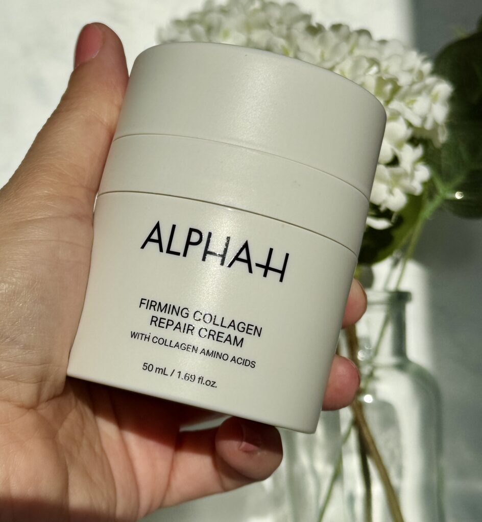 Holding in hand Alpha H Firming Collagen Repair Cream