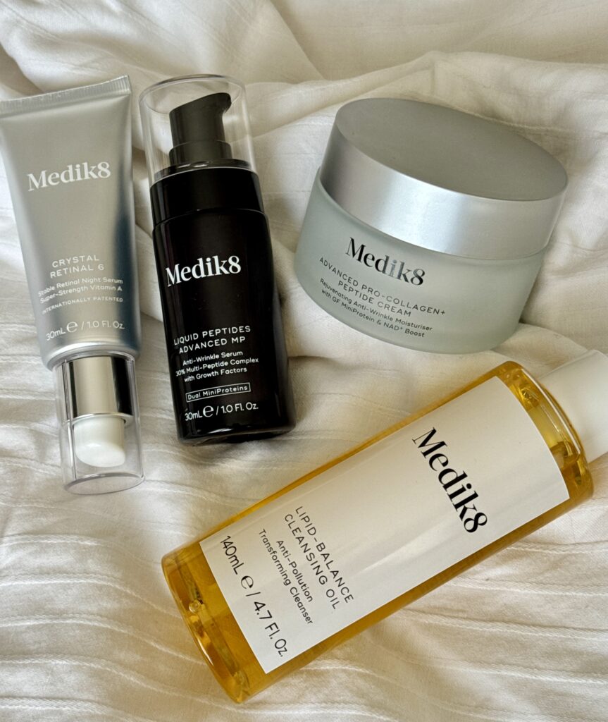 Medik8 Summer Sale picks, products on bed