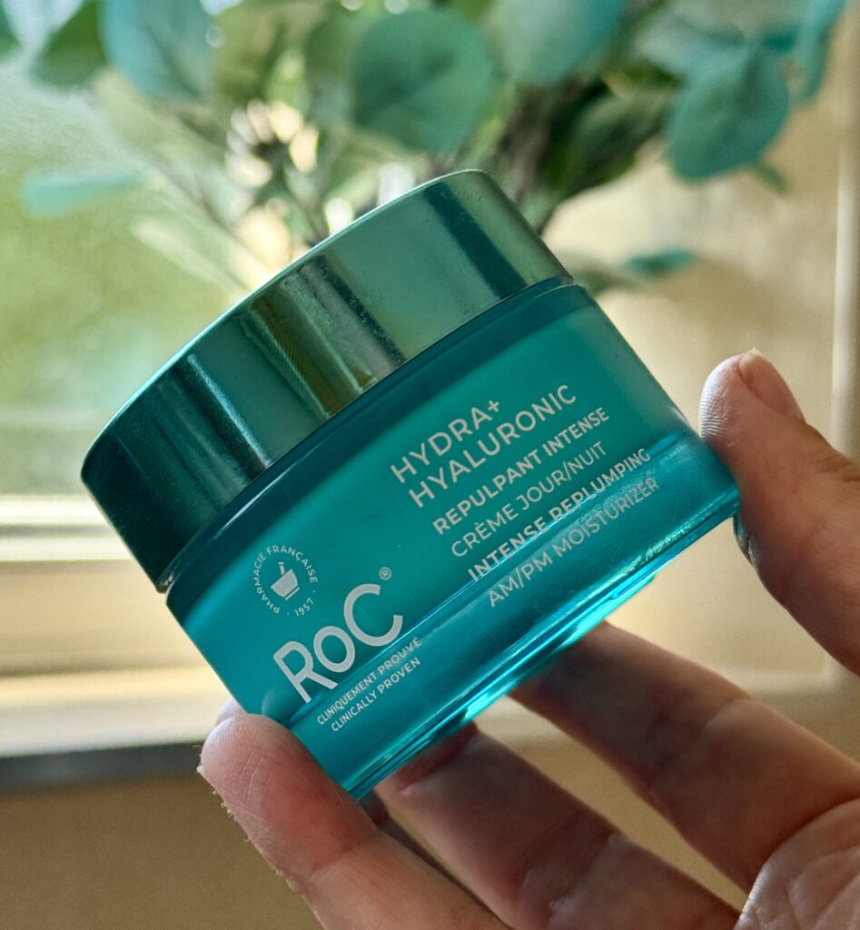 Hand holding the RoC Skincare Hydra+ Hyaluronic Moisturiser